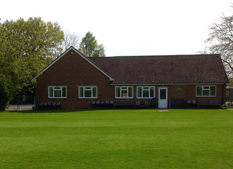 Hall building exterior in a field